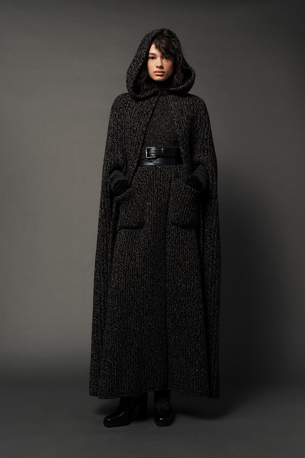 Max Mara Fall/Winter 2025 Fashion Show - Model with Camel Look with Long Coat, Turtleneck, Flared Skirt and Mary Janes.